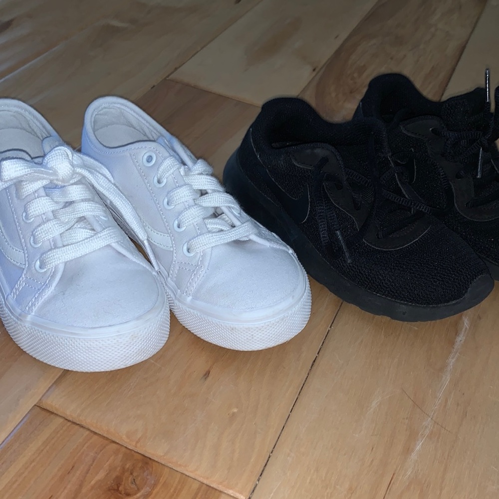 Two pair of boys shoes.